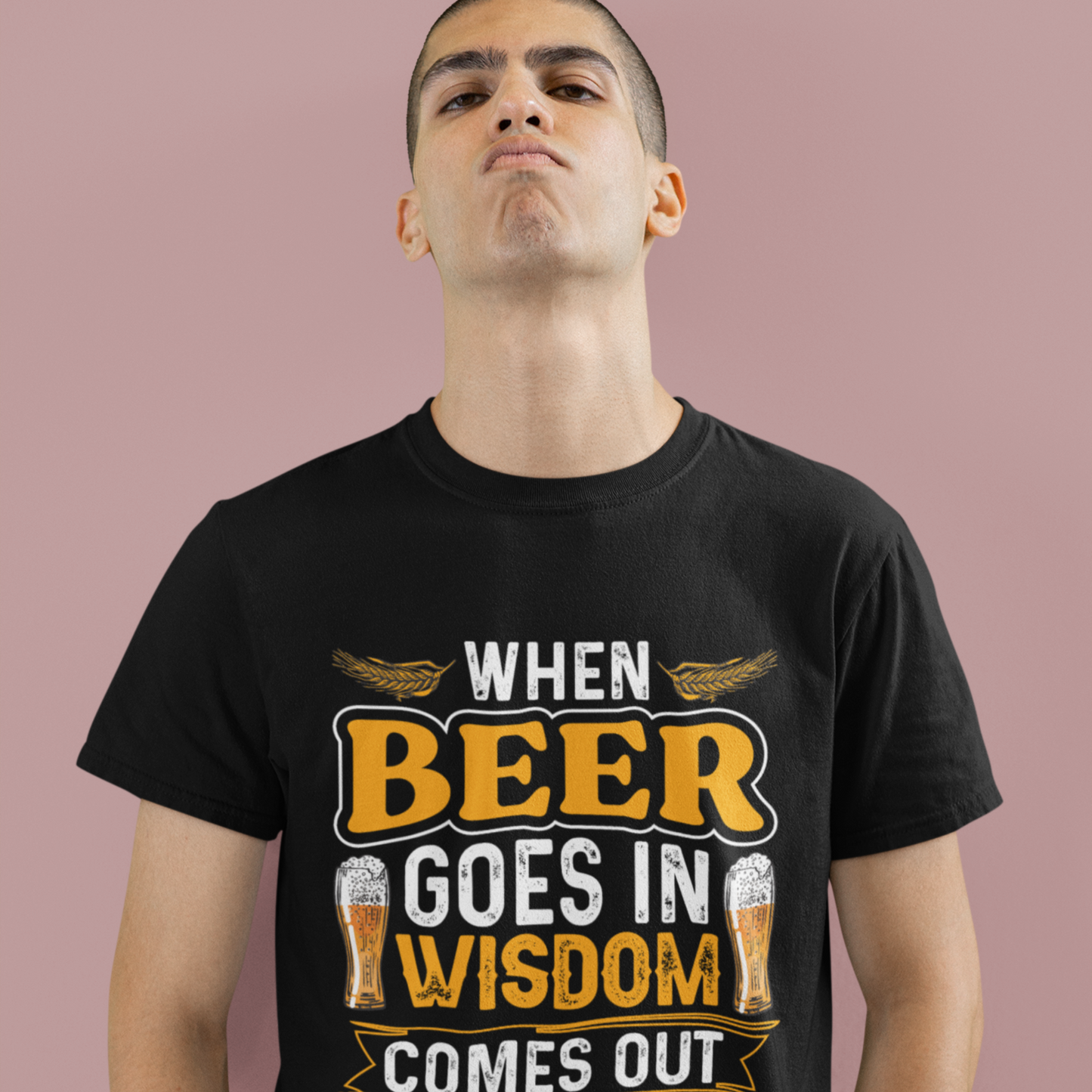Person wearing a black t-shirt with a humorous beer-themed design on a plain background