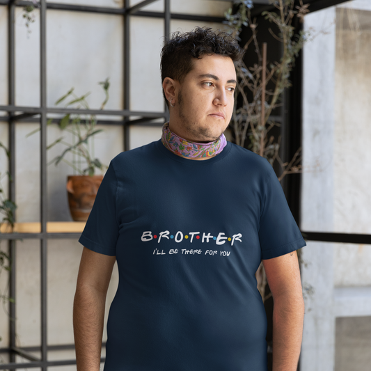 Person wearing a navy blue t-shirt with 'BROTHER I'll be there for you' text, standing indoors.