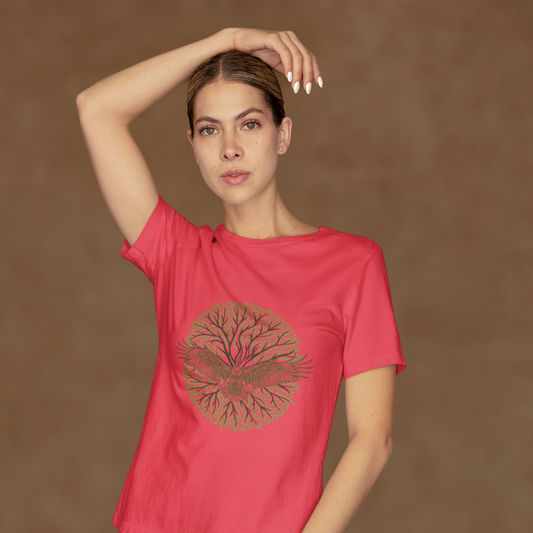 Woman wearing a red t-shirt with a graphic design on a brown background