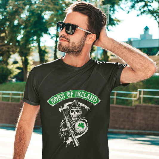 Man wearing a black 'Sons of Ireland' t-shirt outdoors.