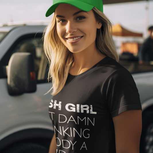Woman wearing a black t-shirt with white text and a green cap, standing in front of a vehicle.