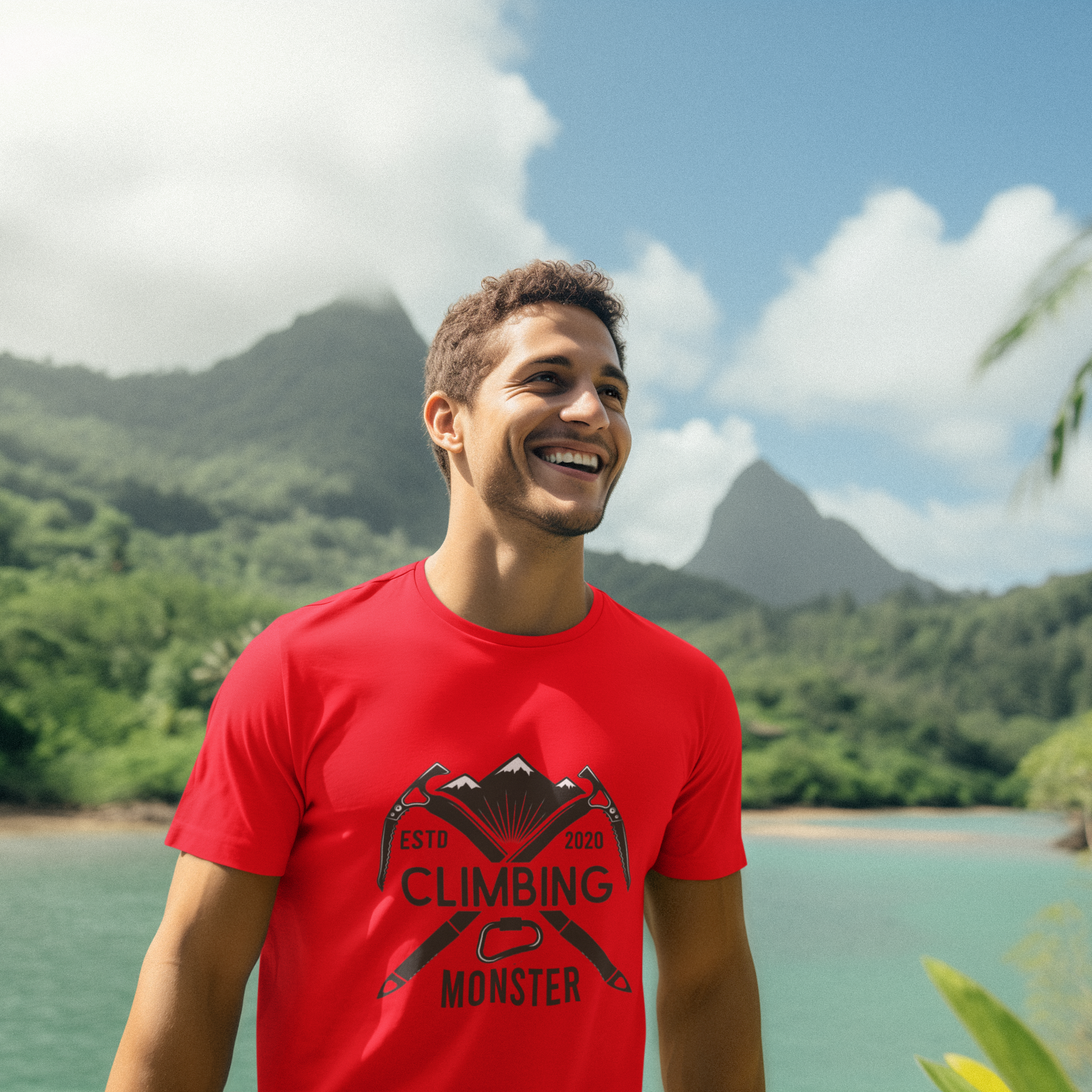 Man wearing a red t-shirt with 'Climbing Monster' graphic in a tropical setting.