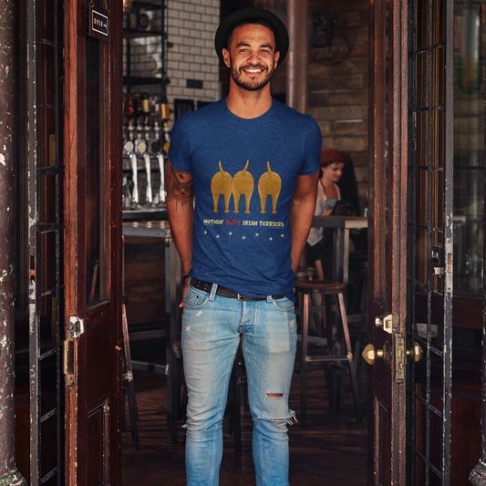 Man wearing a blue t-shirt with a graphic design, standing in a bar.