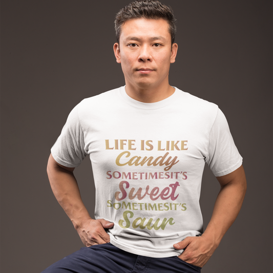 Man wearing a white t-shirt with a colorful text design on a dark background