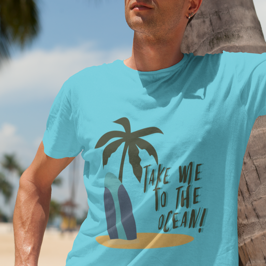 Person wearing a turquoise t-shirt with a palm tree and beach graphic on a beach background