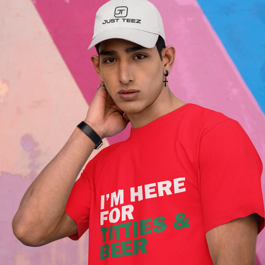 Person wearing a red t-shirt with text and a white cap against a colorful background