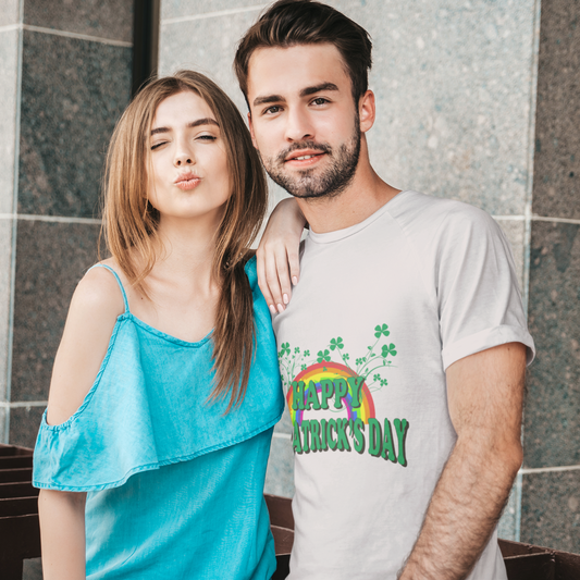 Man and woman standing together with a man wearing a 'Happy St. Patrick's Day' t-shirt.