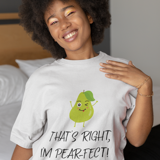 Person wearing a white t-shirt with a pear graphic and text, standing in a bedroom.