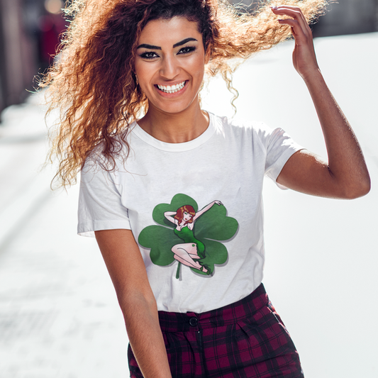 Woman wearing a white t-shirt with a graphic design outdoors