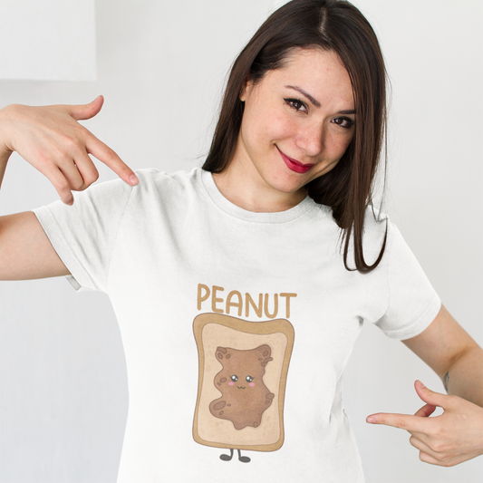 Woman wearing a white t-shirt with a cartoon bear in a peanut butter jar design.