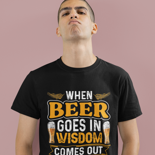 Person wearing a black t-shirt with a humorous beer-themed design on a plain background