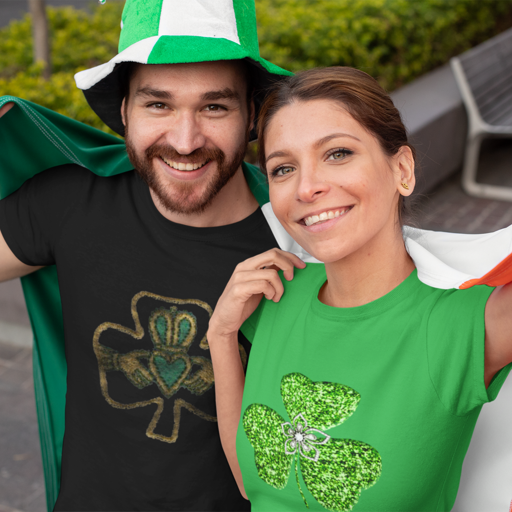 Two people wearing green and orange clothing, likely for a St. Patrick's Day celebration.