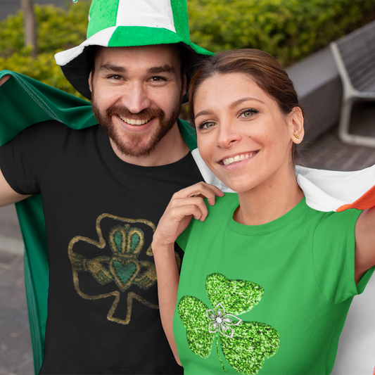 Two people wearing green and orange clothing, likely for a St. Patrick's Day celebration.