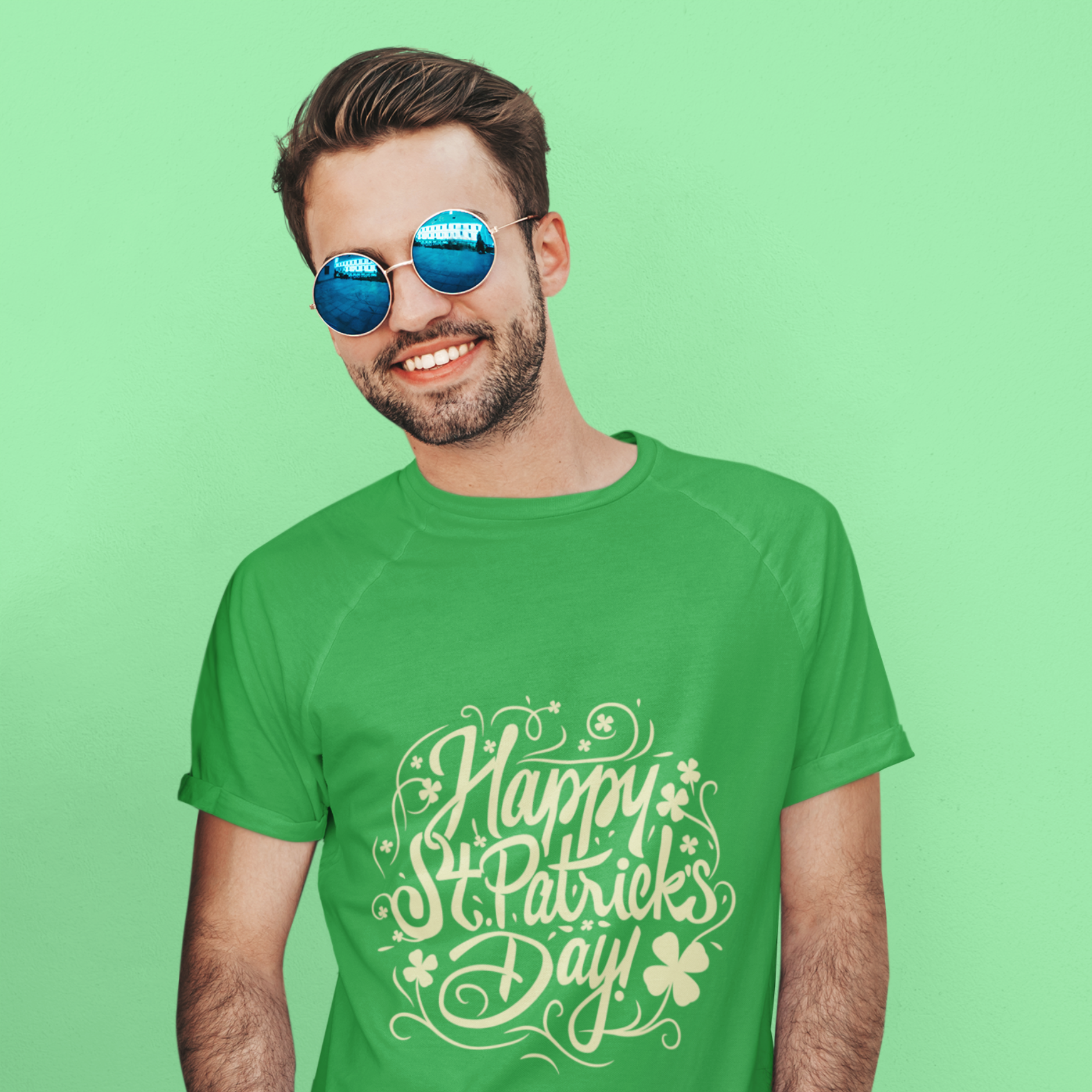 Man wearing a green 'Happy St. Patrick's Day' t-shirt against a green background
