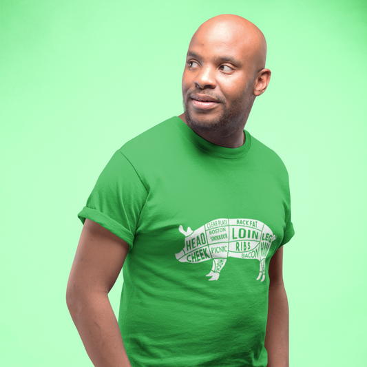 Man wearing a green t-shirt with text and graphic design on a solid background