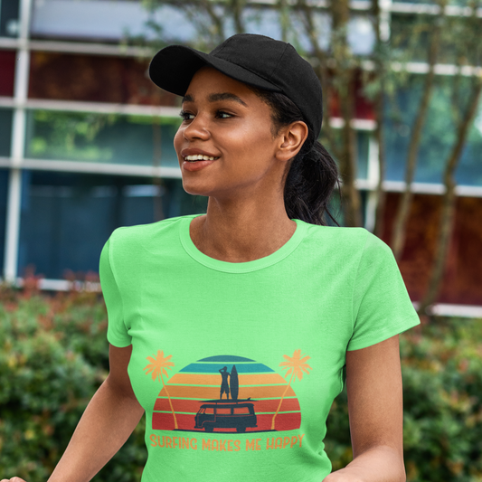 Woman wearing a green t-shirt with a graphic design, standing next to a bicycle.