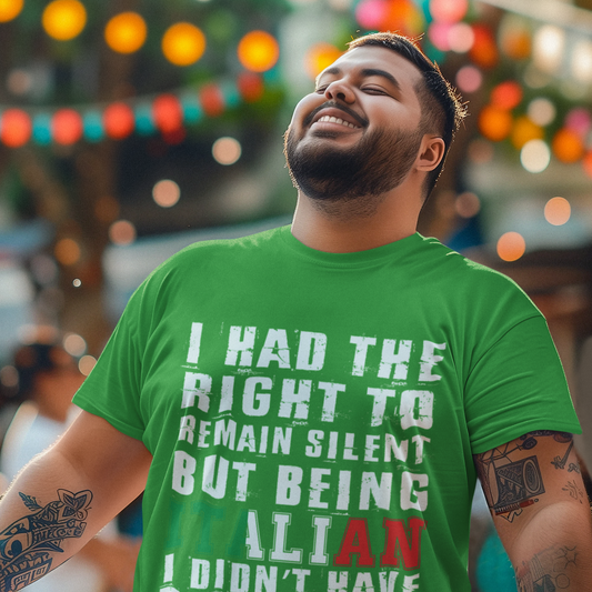 Man wearing a green t-shirt with text in an outdoor setting with colorful lights.