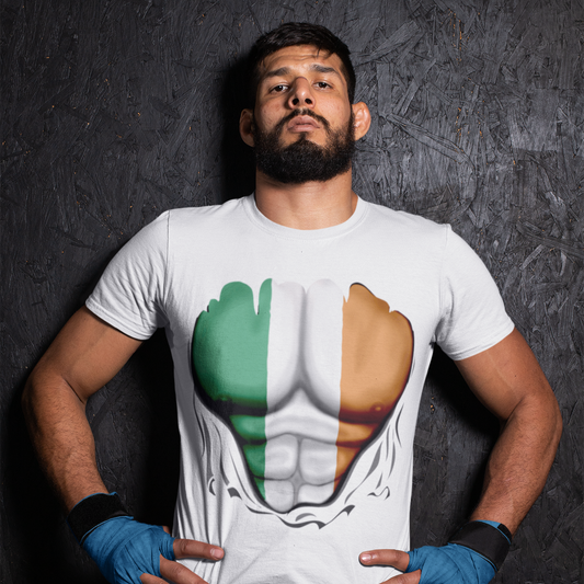 Man wearing a white t-shirt with a graphic design of a muscular torso in Irish flag colors against a dark background.