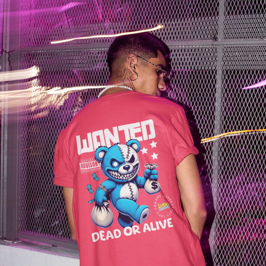 Person wearing a red t-shirt with a blue bear graphic and text, standing in front of a modern interior.